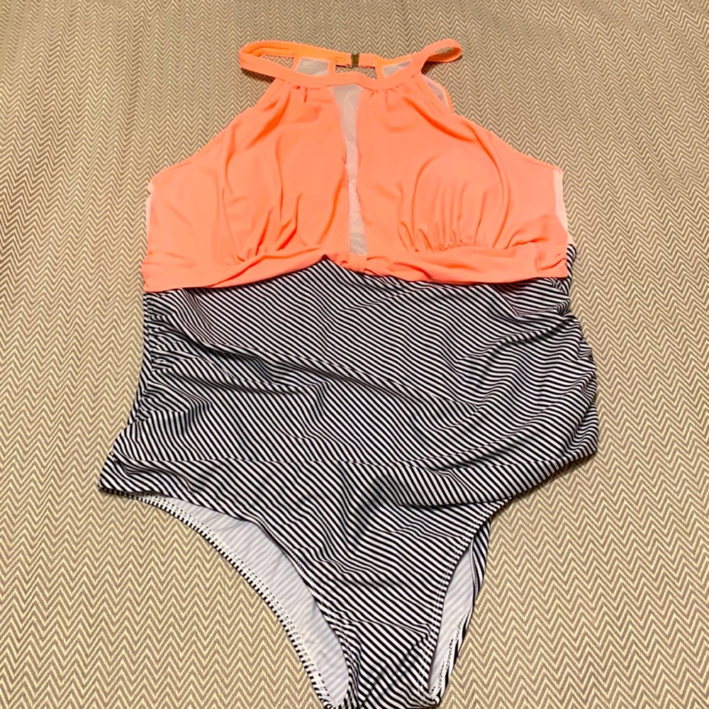 NWT. Aqua Eve one-piece swimsuit. Bright peach with striped bottom. Size 20W.